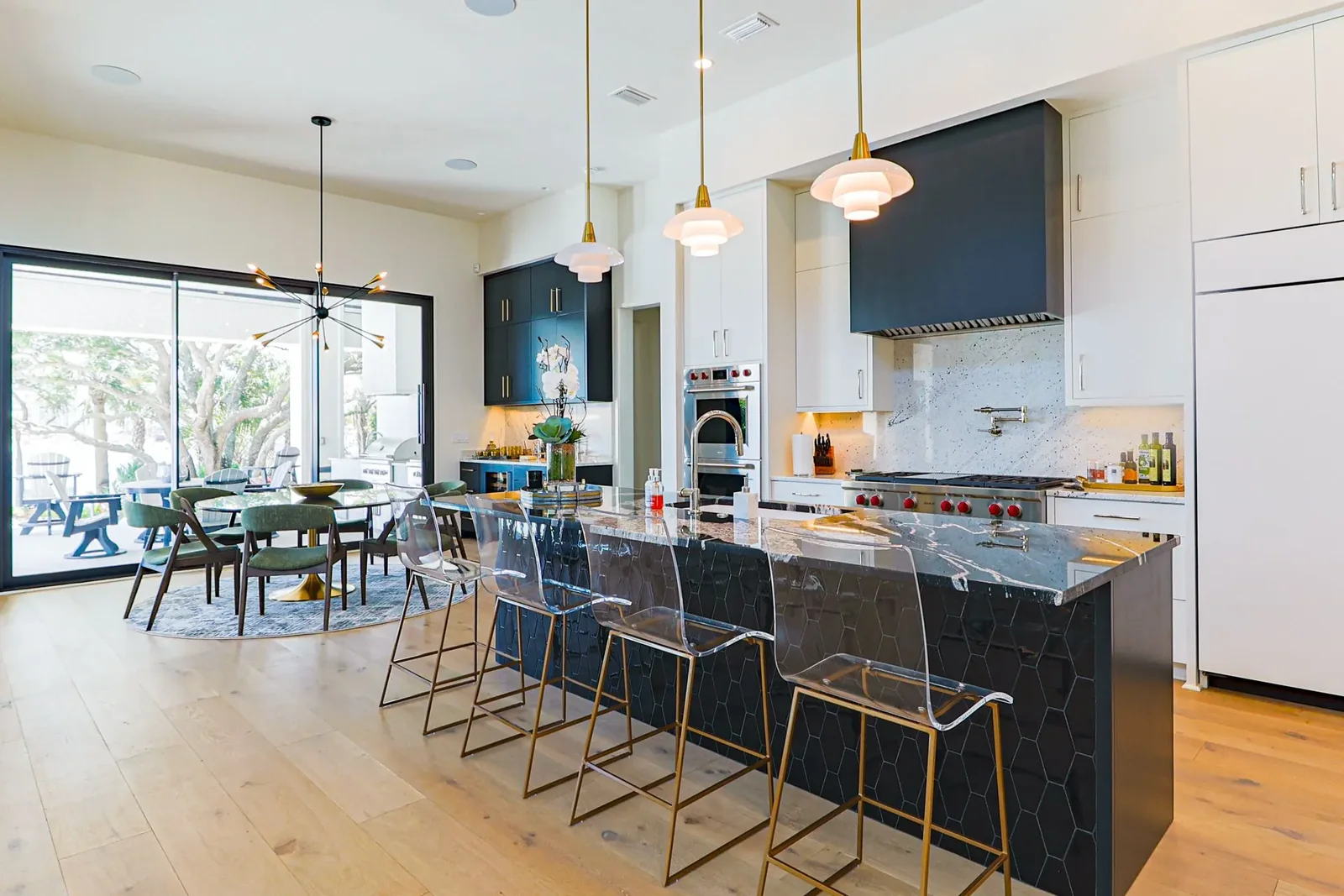 Florida villa project kitchen with tall cabinets, wall cabinets and an island