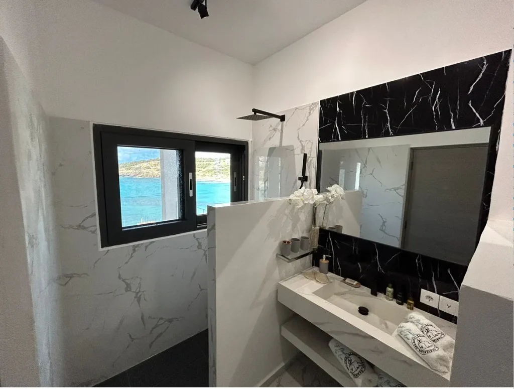 GEORGE Group hotel image showing a bathroom vanity area.