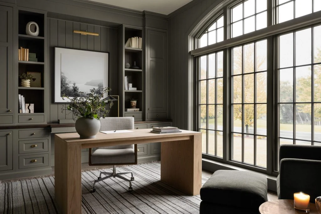 GEORGE home-office design with a freestanding desk facing a wall of fitted shelves, drawers and cabinets
