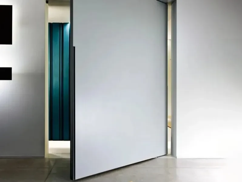 GEORGE design detail of a concealed doorway aligned with a pale wall panel surface and dark vertical reveal.